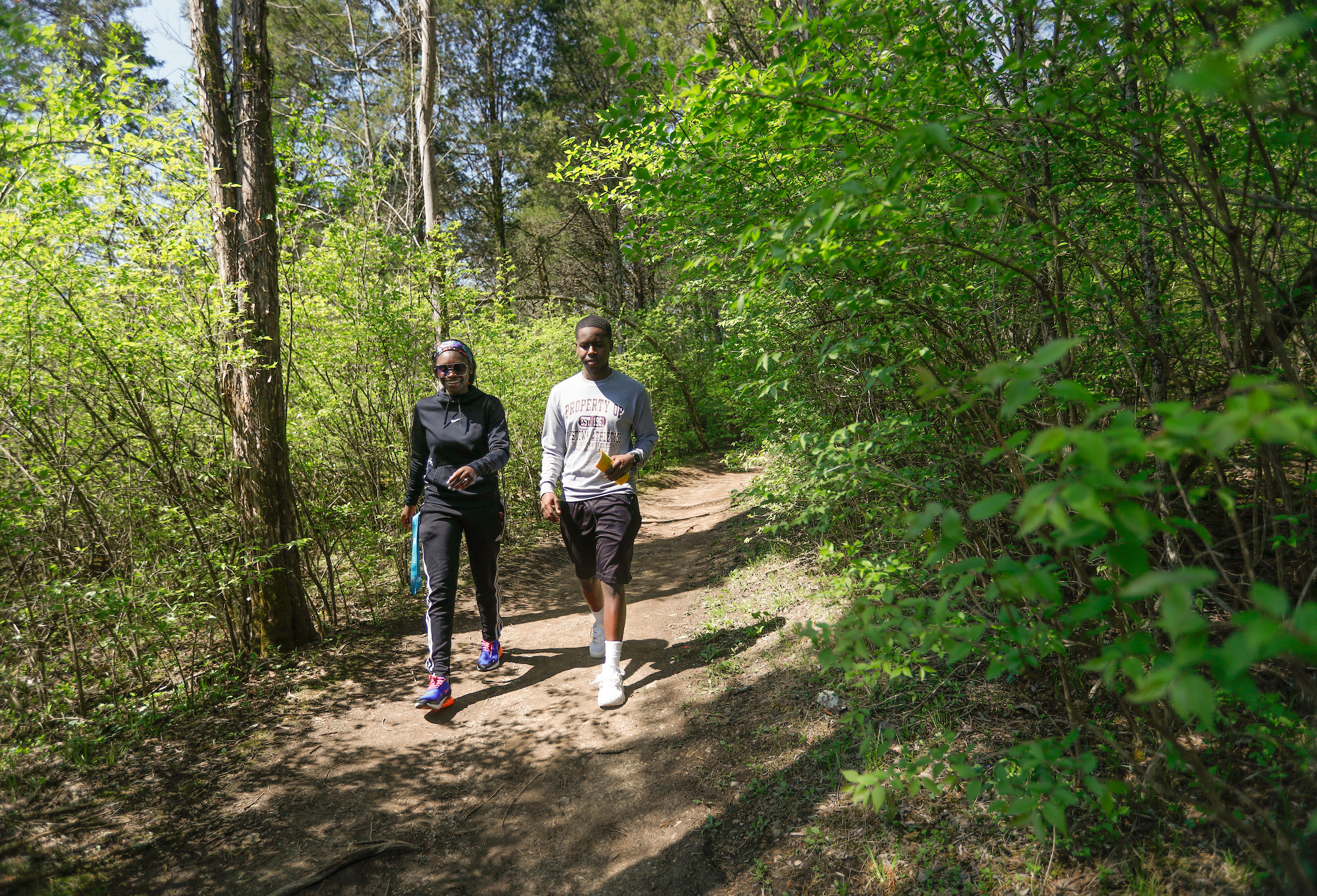 People walking on a trail.