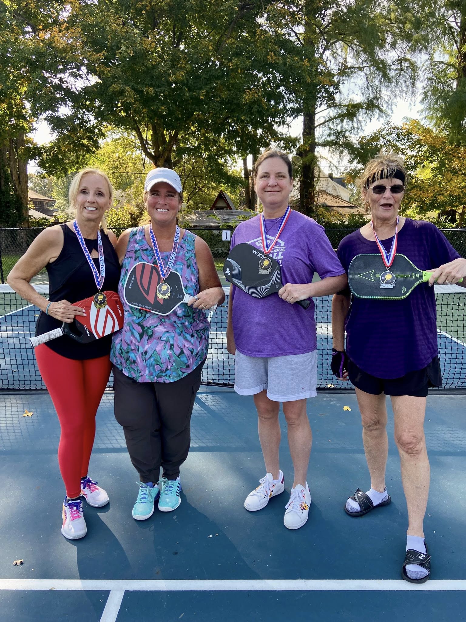 People playing pickleball.