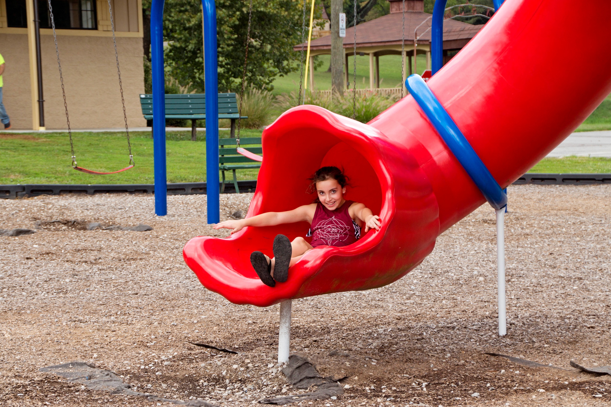 Child going down a slide.