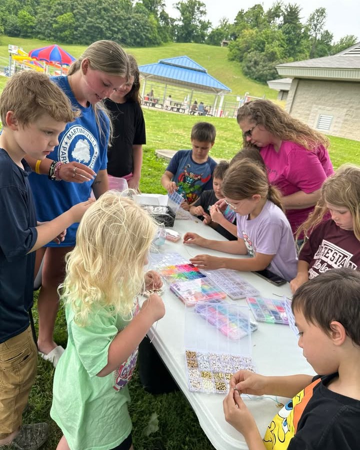 Children making bracelets.